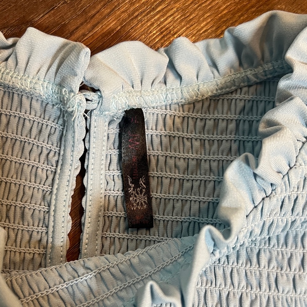 Sky Blue Ruffled Sleeveless Blouse - Picture 2 of 5